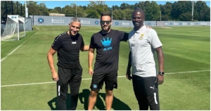 Chris Hughton and assistant George Boateng arrive in Charlotte ahead of USA and Mexico friendlies
