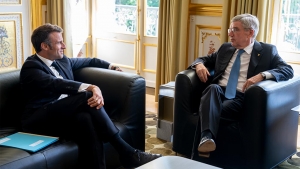 IOC President Bach welcomed by French President Macron in Paris