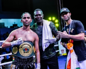 Coach Ebenezer  Adjei Wins Three Title Belts On One Night